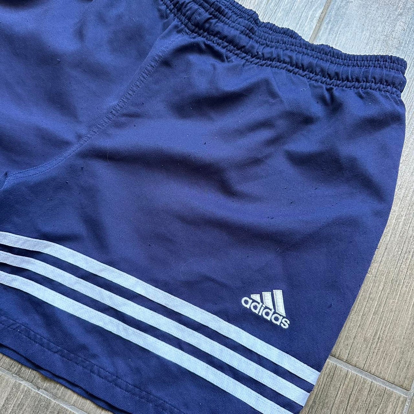 Adidas navy blue shorts with white stripes