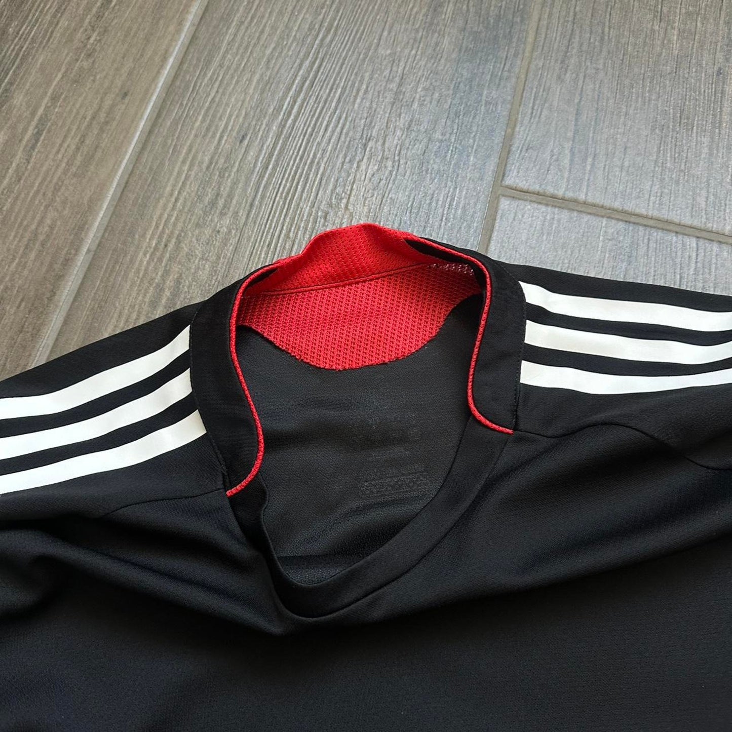 Adidas black & red soccer jersey