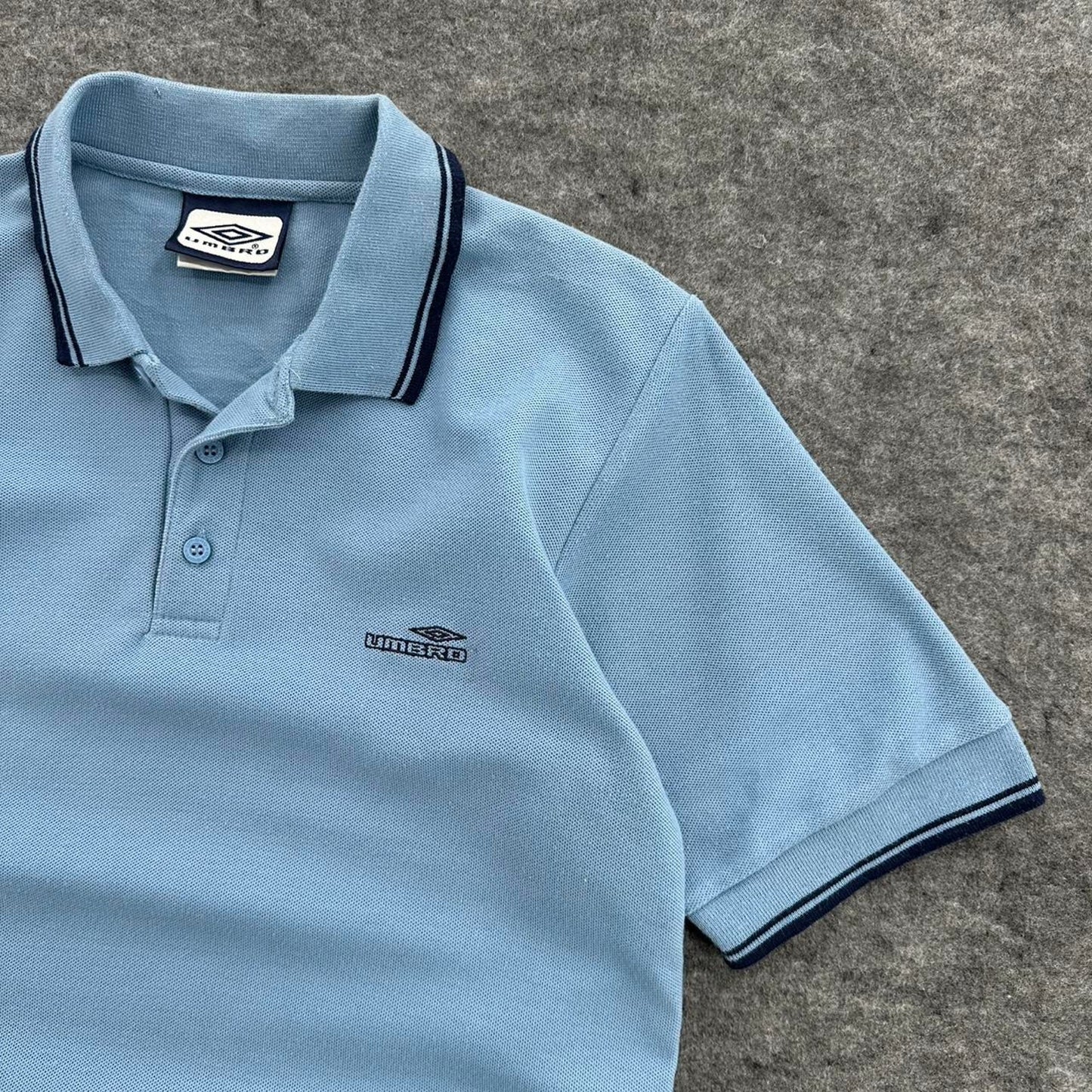 Umbro blue polo shirt