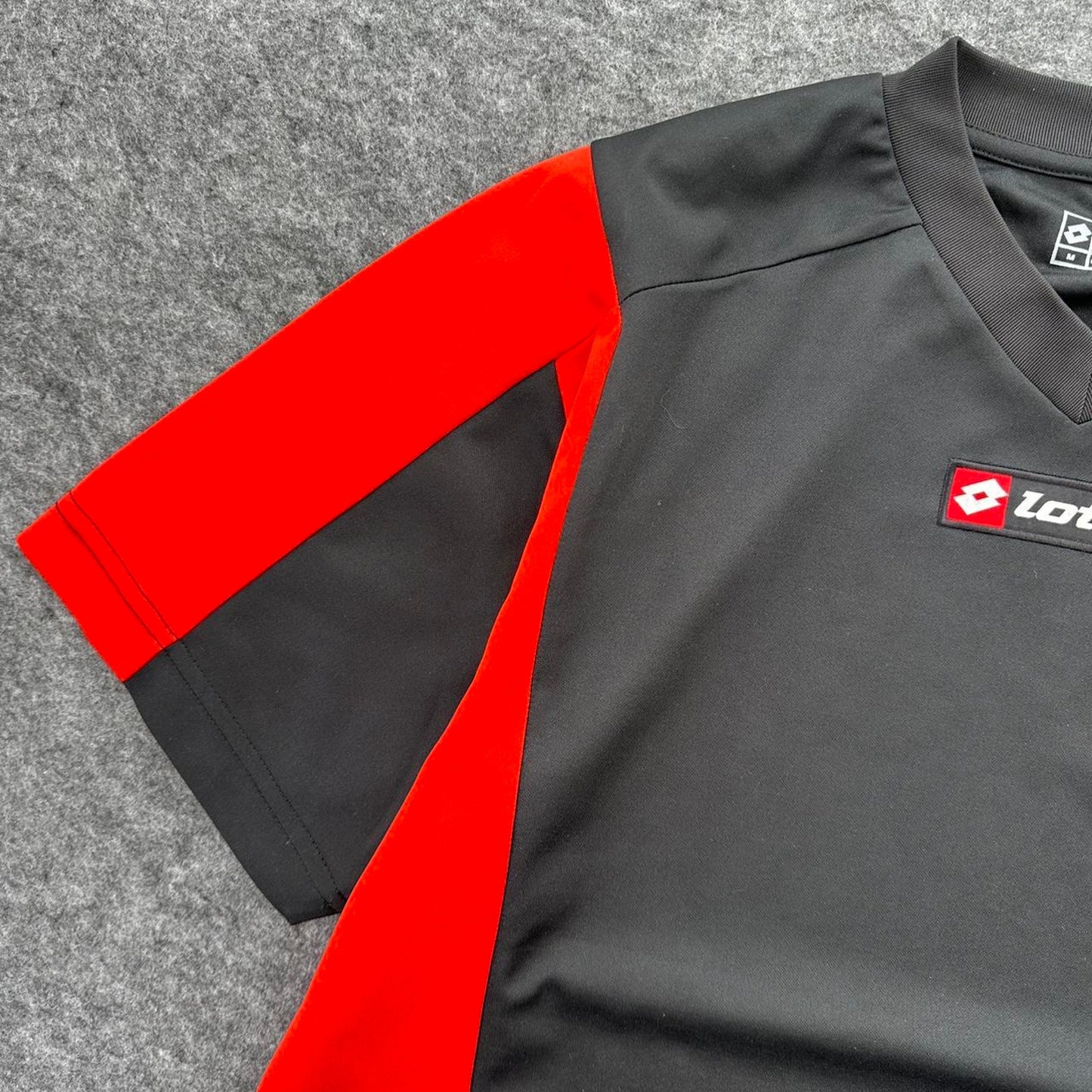 Lotto blackred soccer jersey with