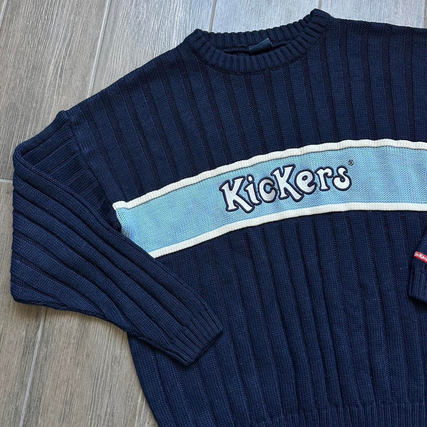 Kickers navy blue sweater with white and light blue accents