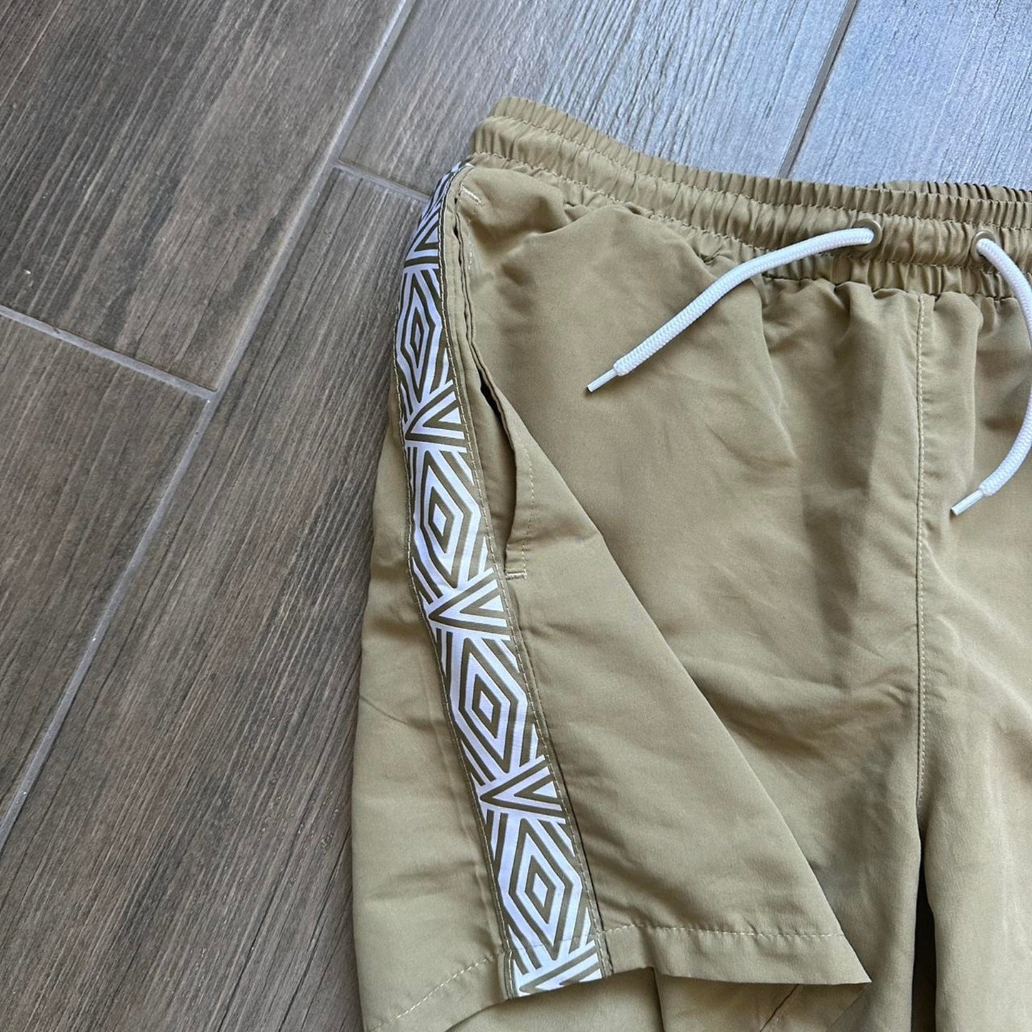 Umbro khaki shorts with white
