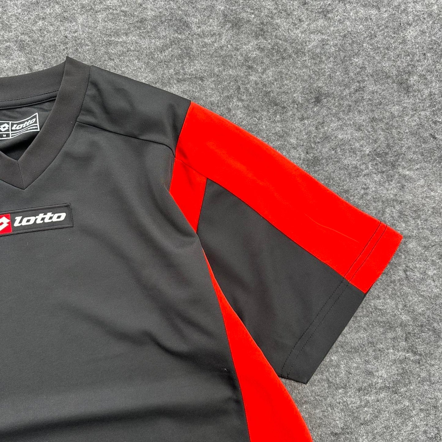 Lotto blackred soccer jersey with