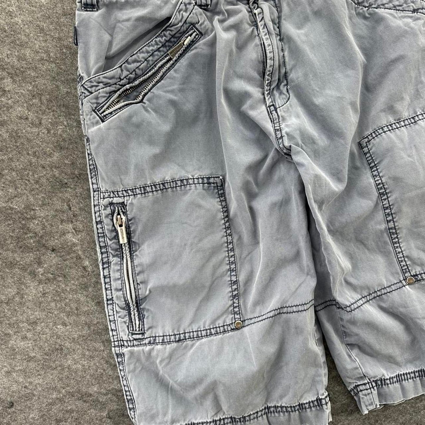 Grey cargo shorts with multiple