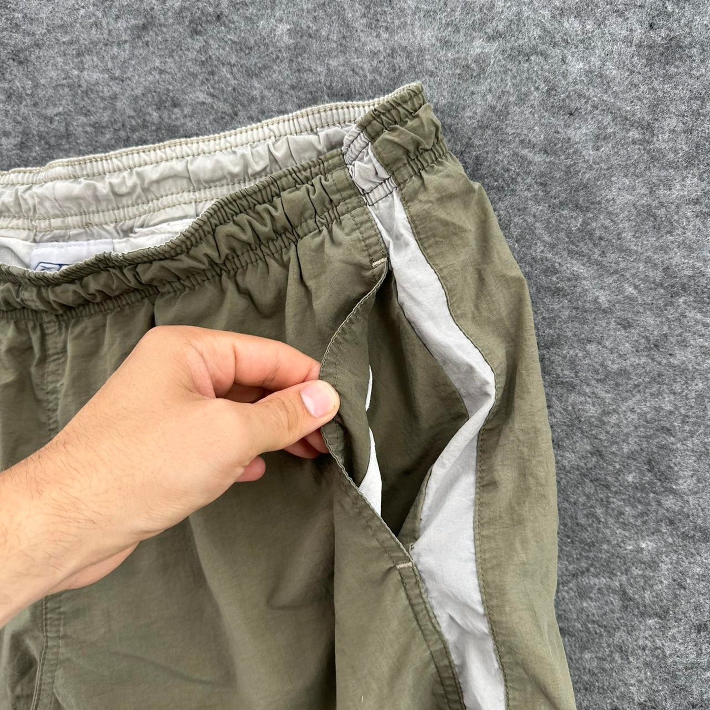 Reebok khaki shorts with white
