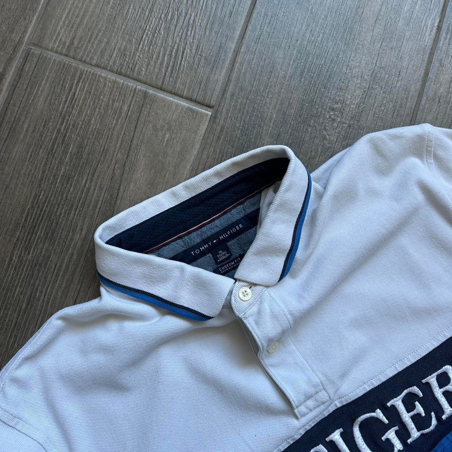 Tommy Hilfiger blue and white polo shirt