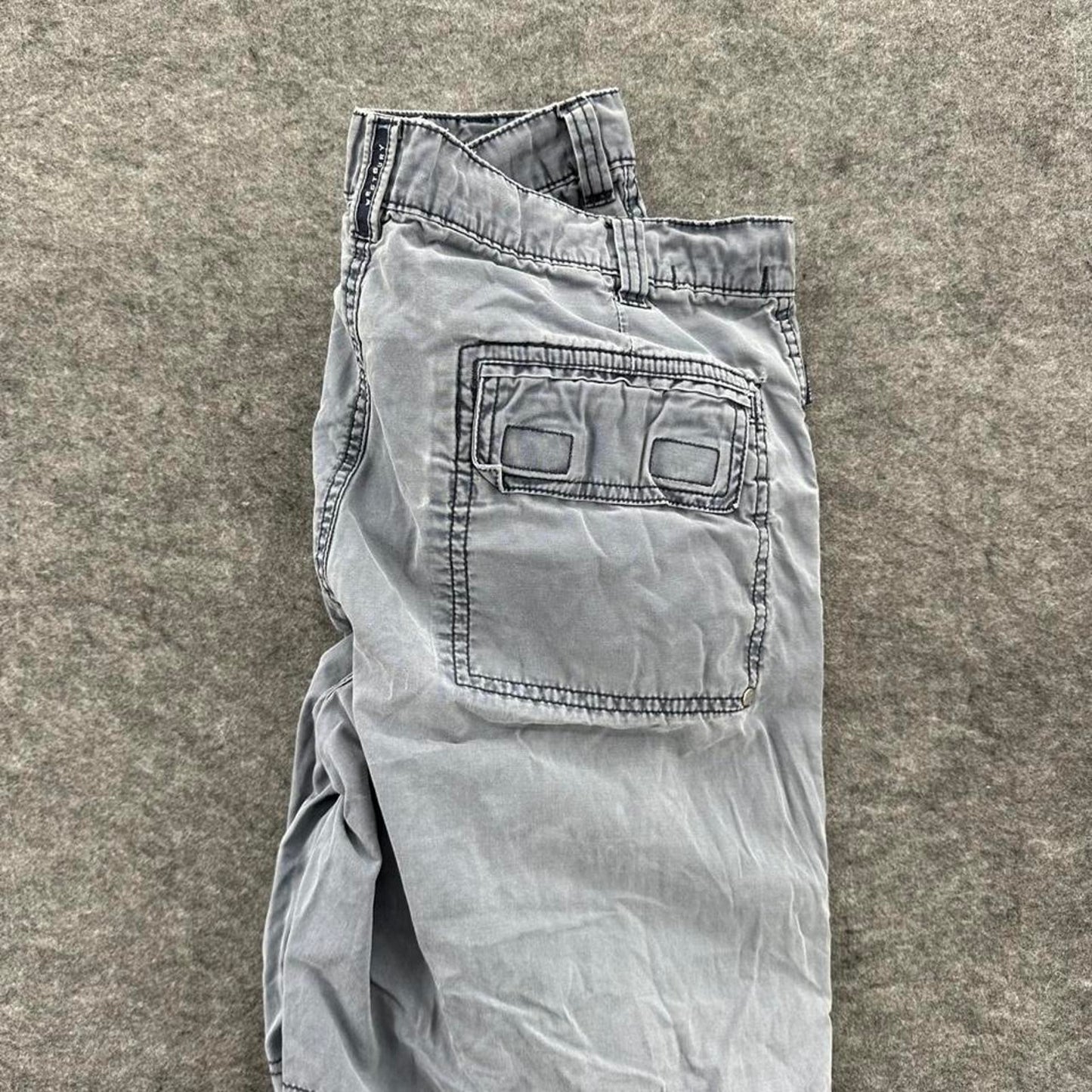 Grey cargo shorts with multiple