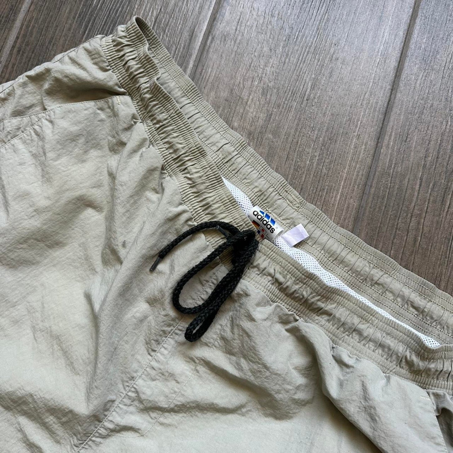 Adidas khaki shorts with drawstring waist and pockets