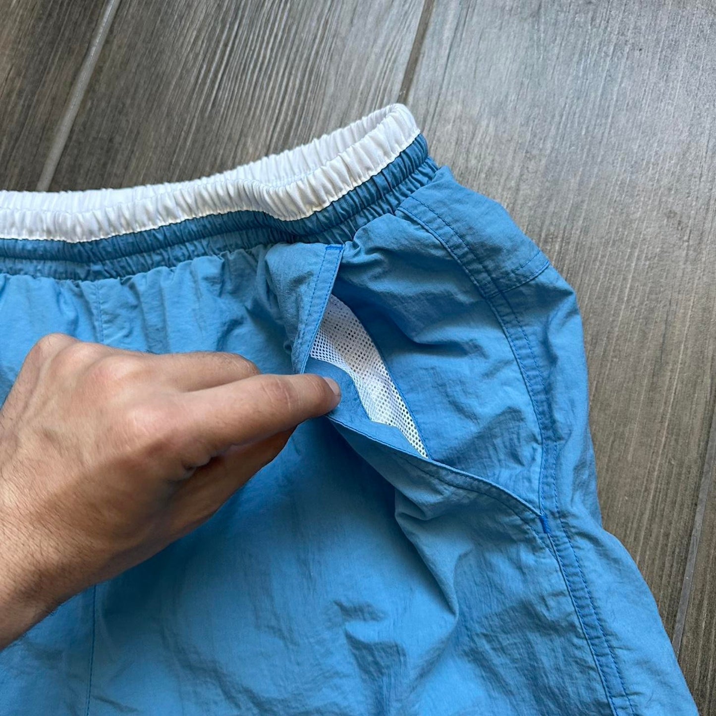 Adidas blue shorts with white