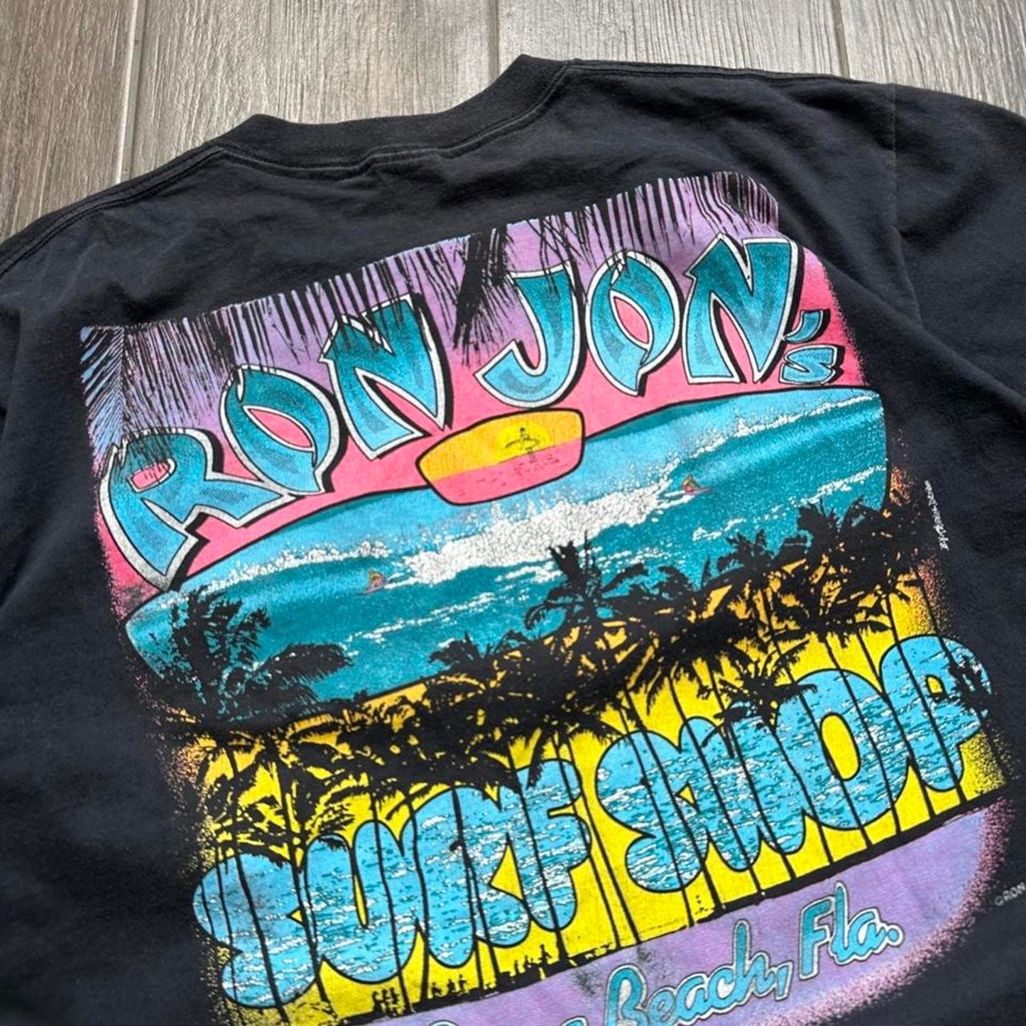 Ron Jon Surf Shop black t-shirt with colorful graphic