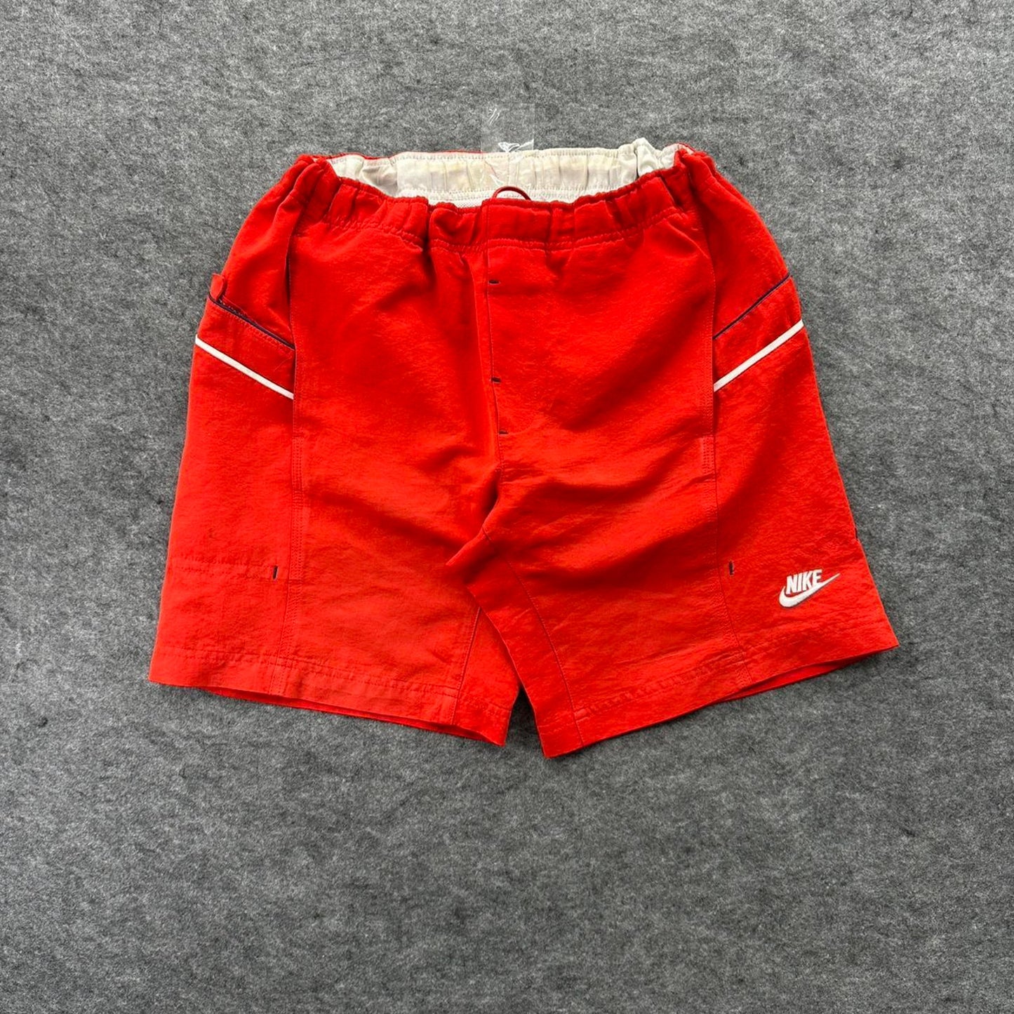 Nike red shorts with white