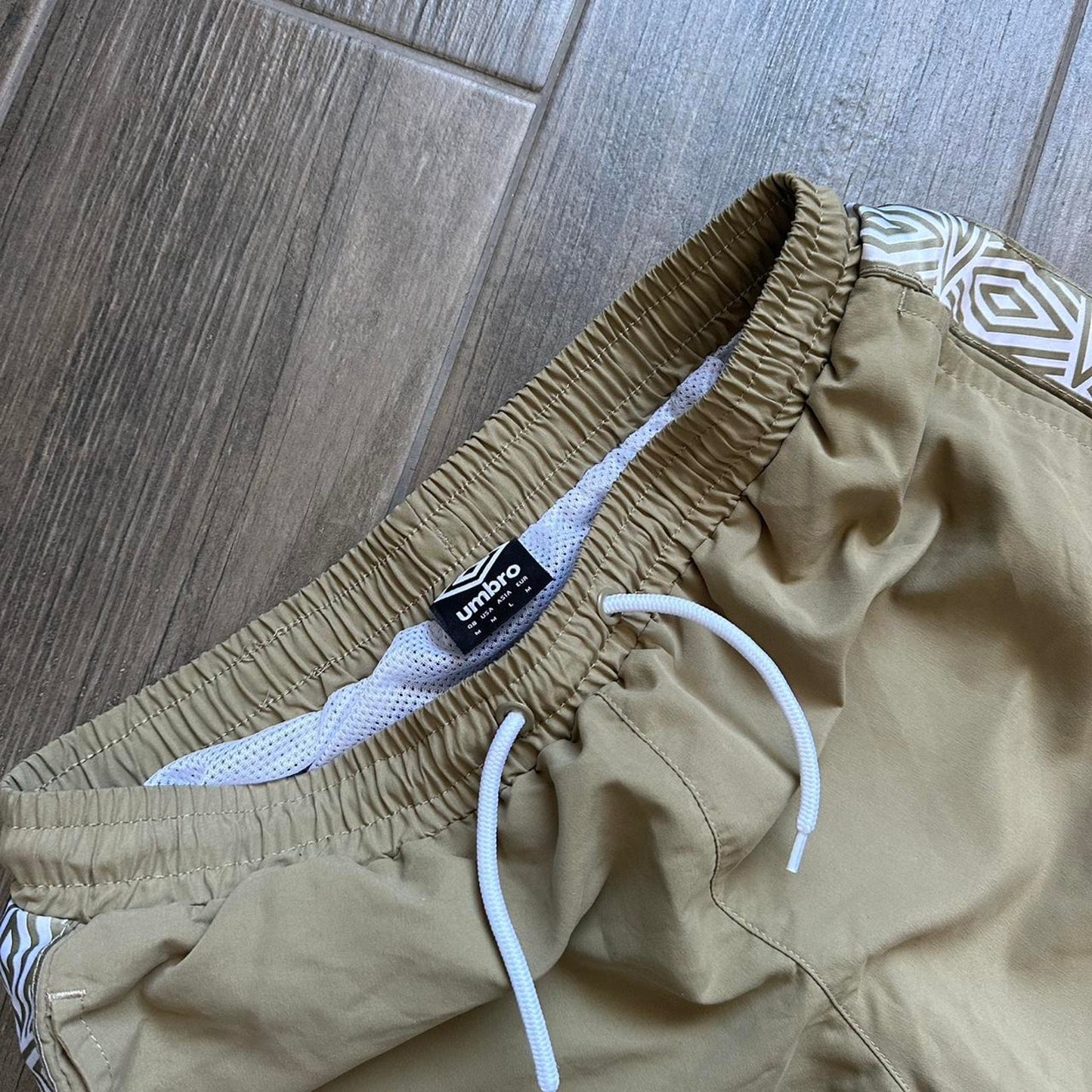 Umbro khaki shorts with white
