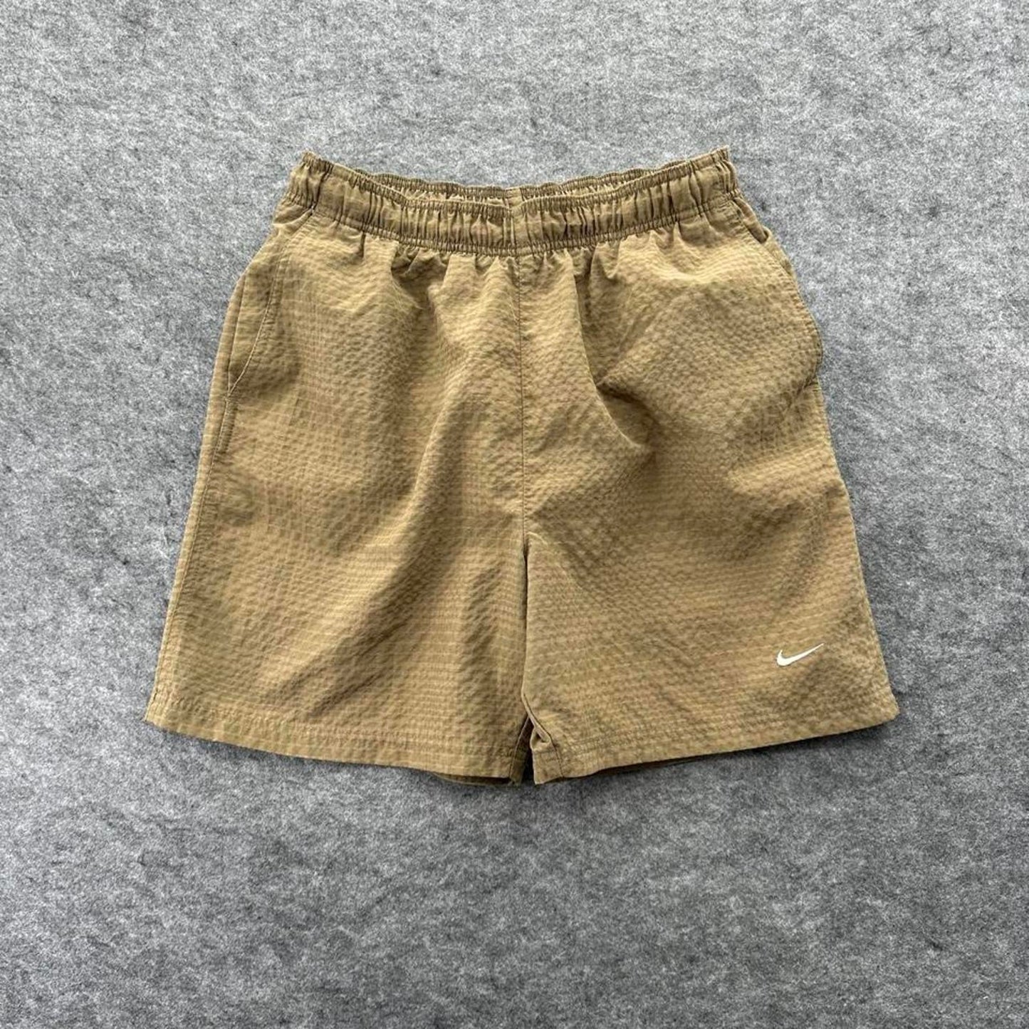 Nike brown shorts with white
