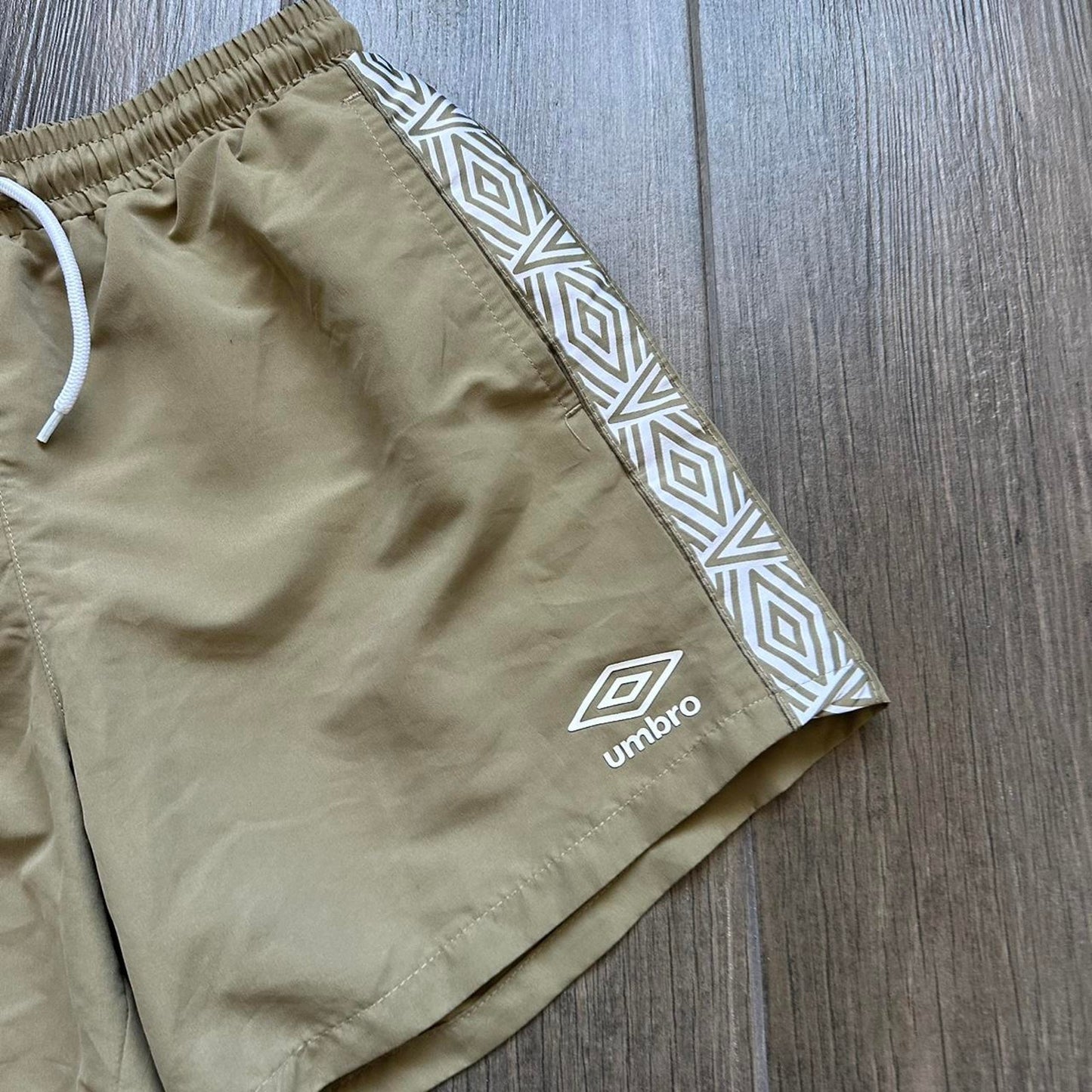Umbro khaki shorts with white