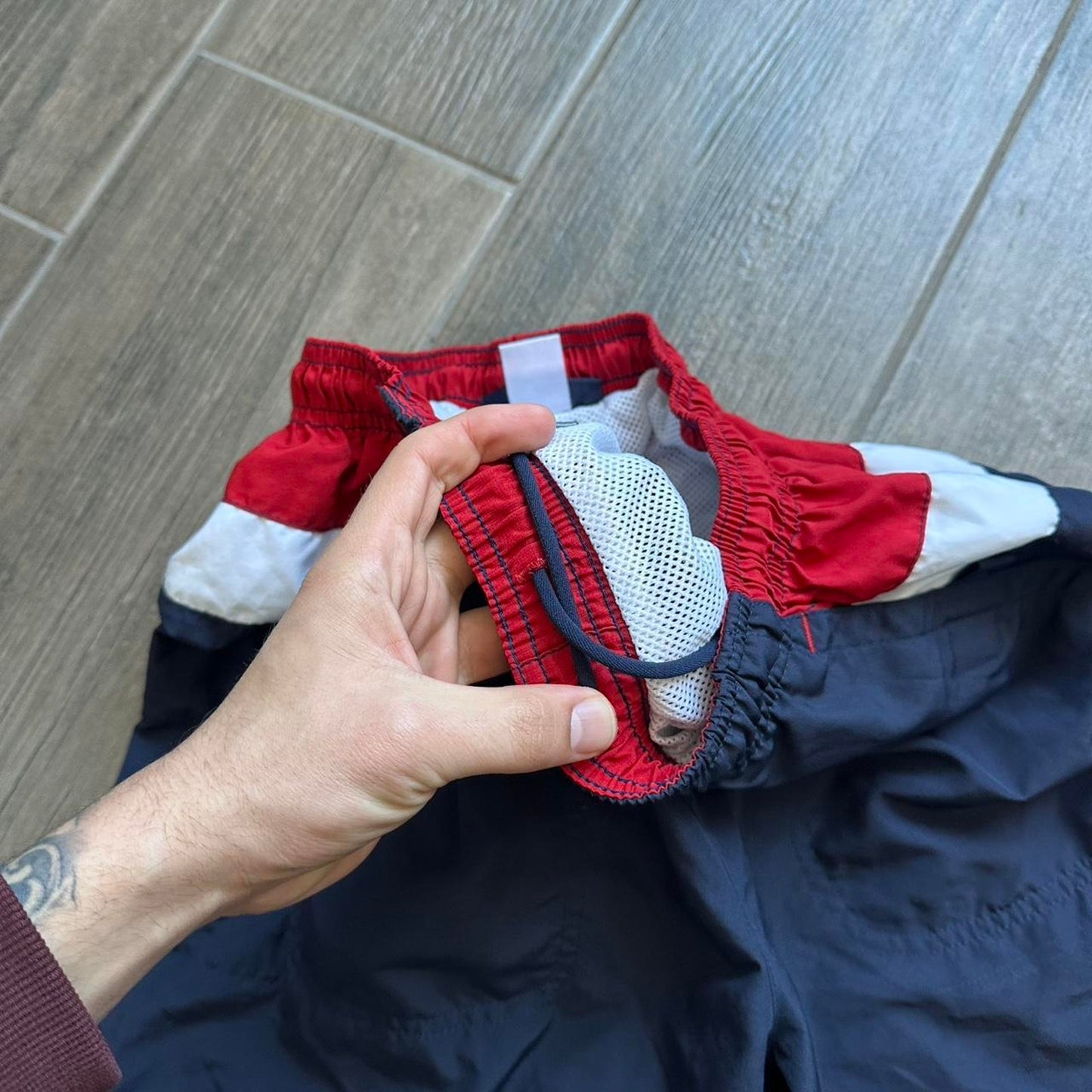 Reebok navy blue shorts with red accents