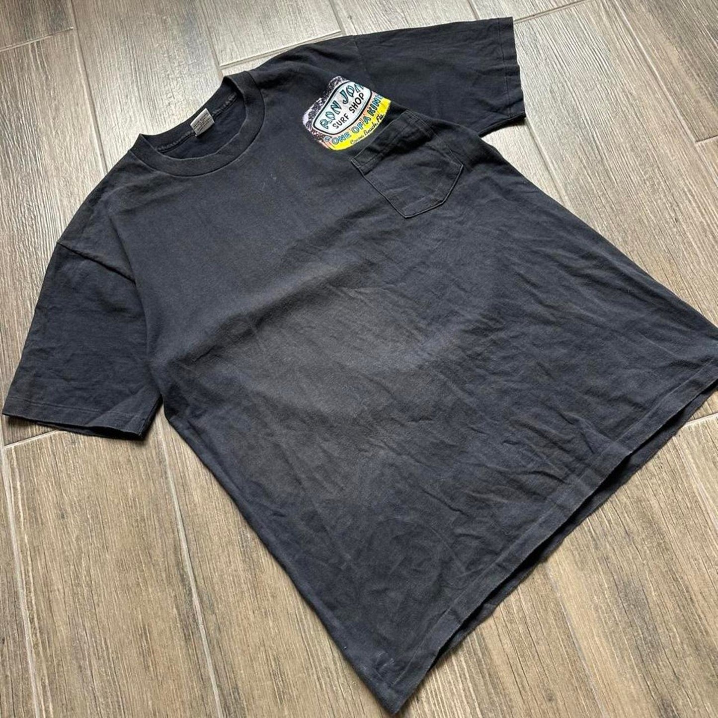 Ron Jon Surf Shop black t-shirt with colorful graphic