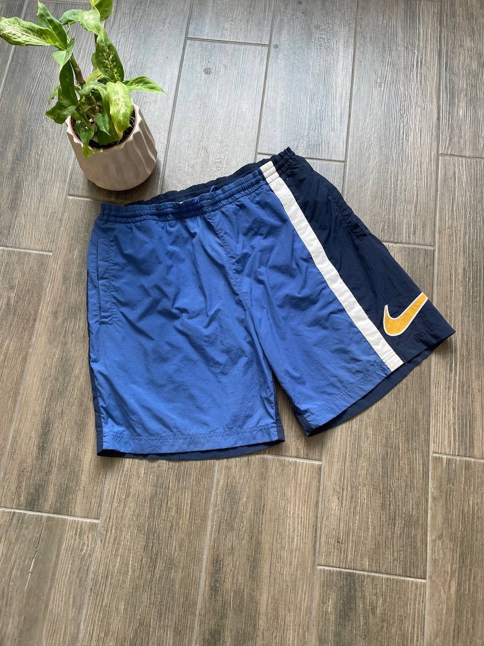 Nike big swoosh navy 90s baggy shorts