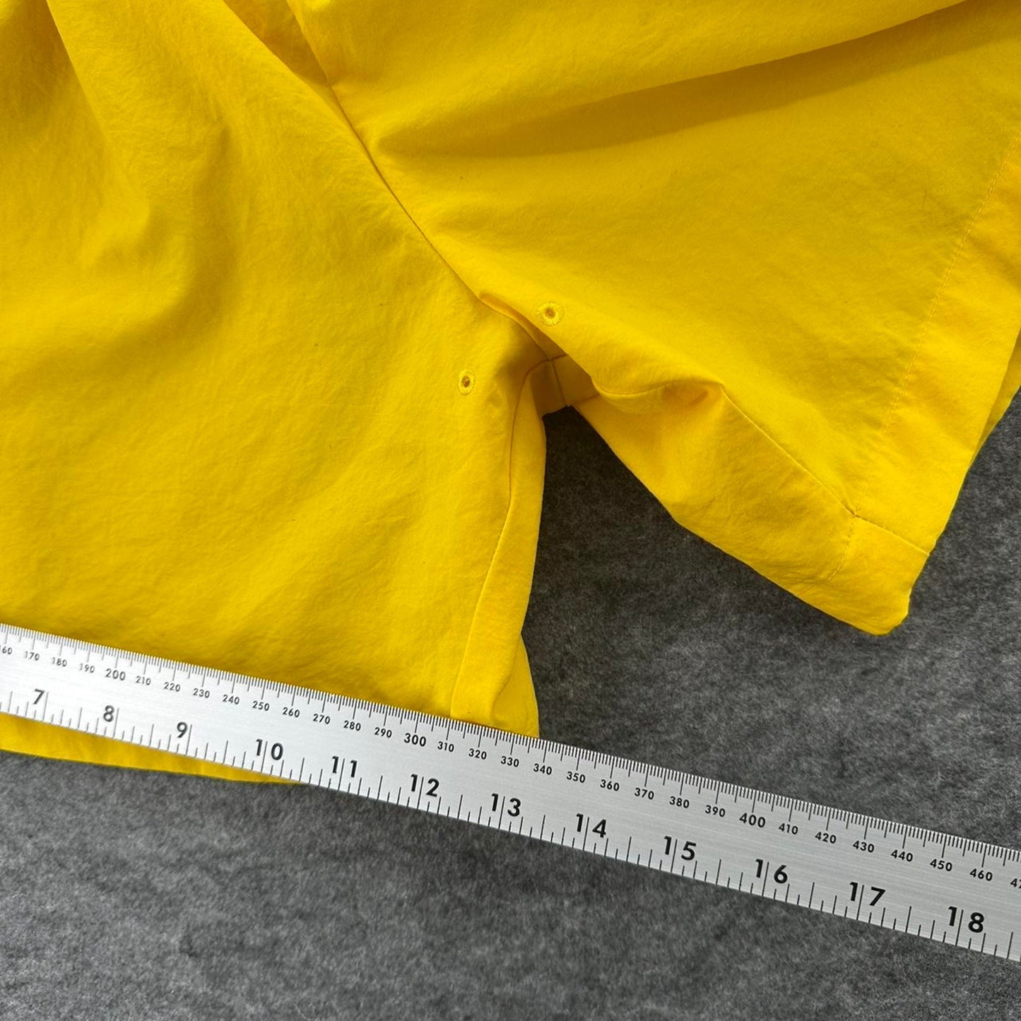 Nike yellow track shorts