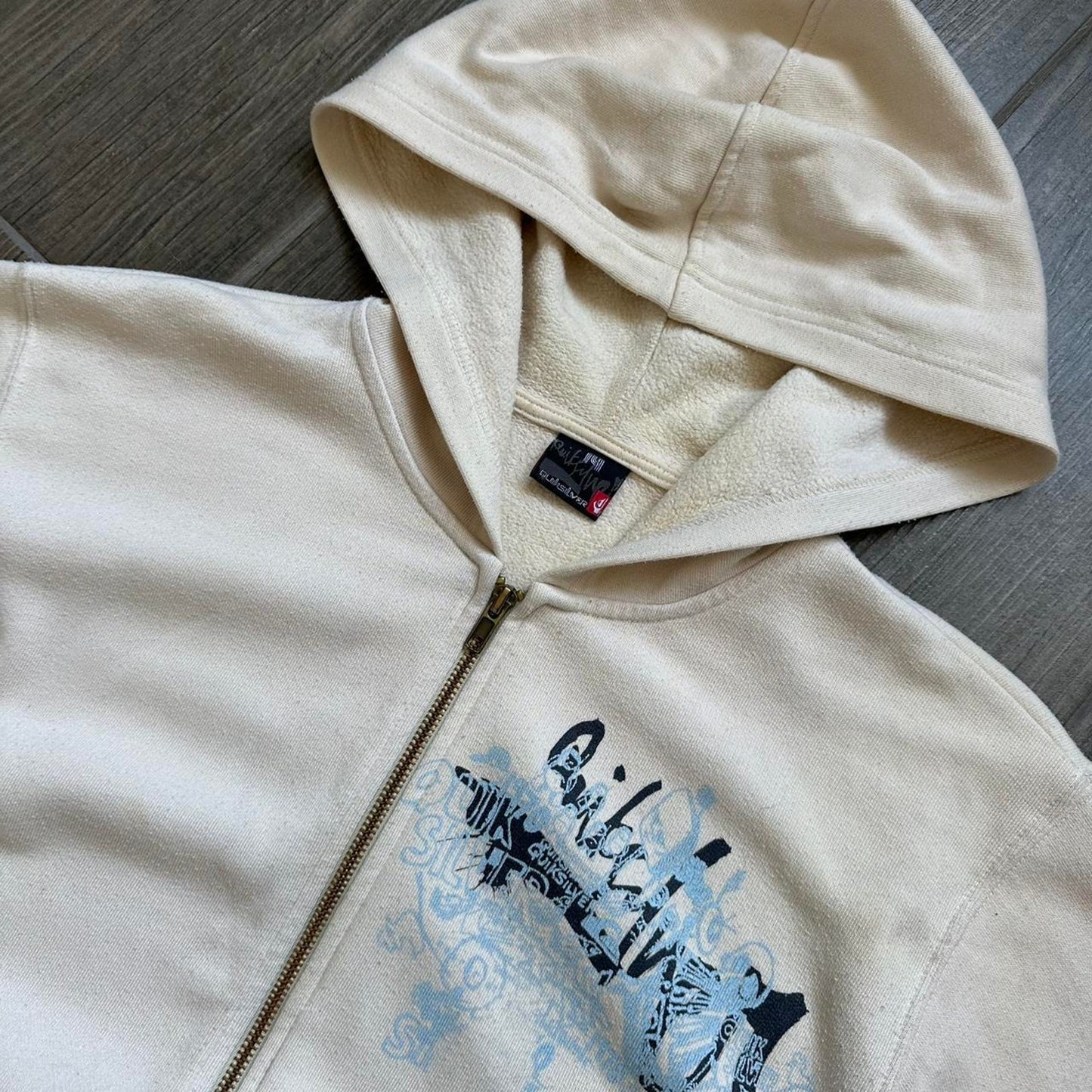 Quiksilver women cream zip up hoodie with blue graphic