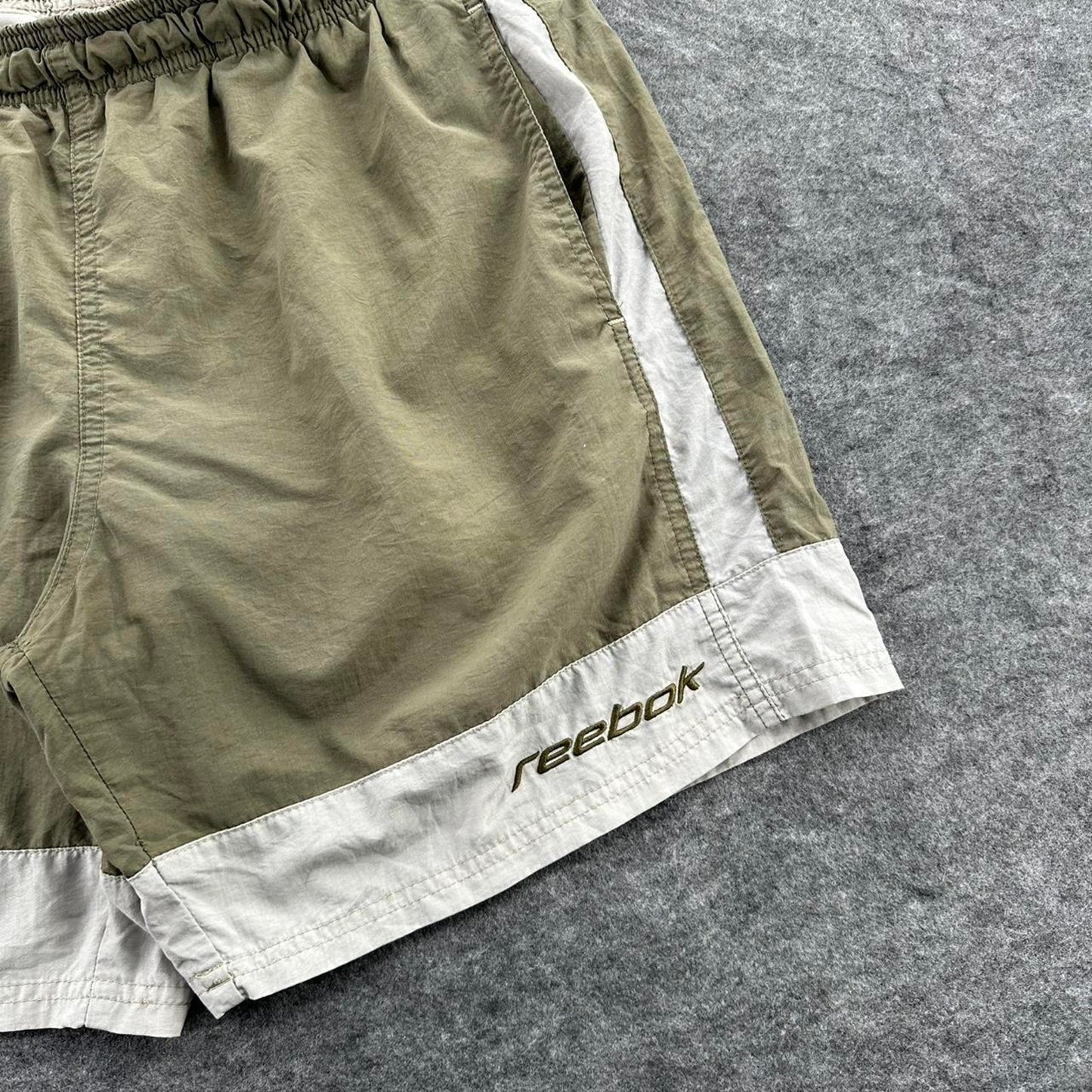 Reebok khaki shorts with white