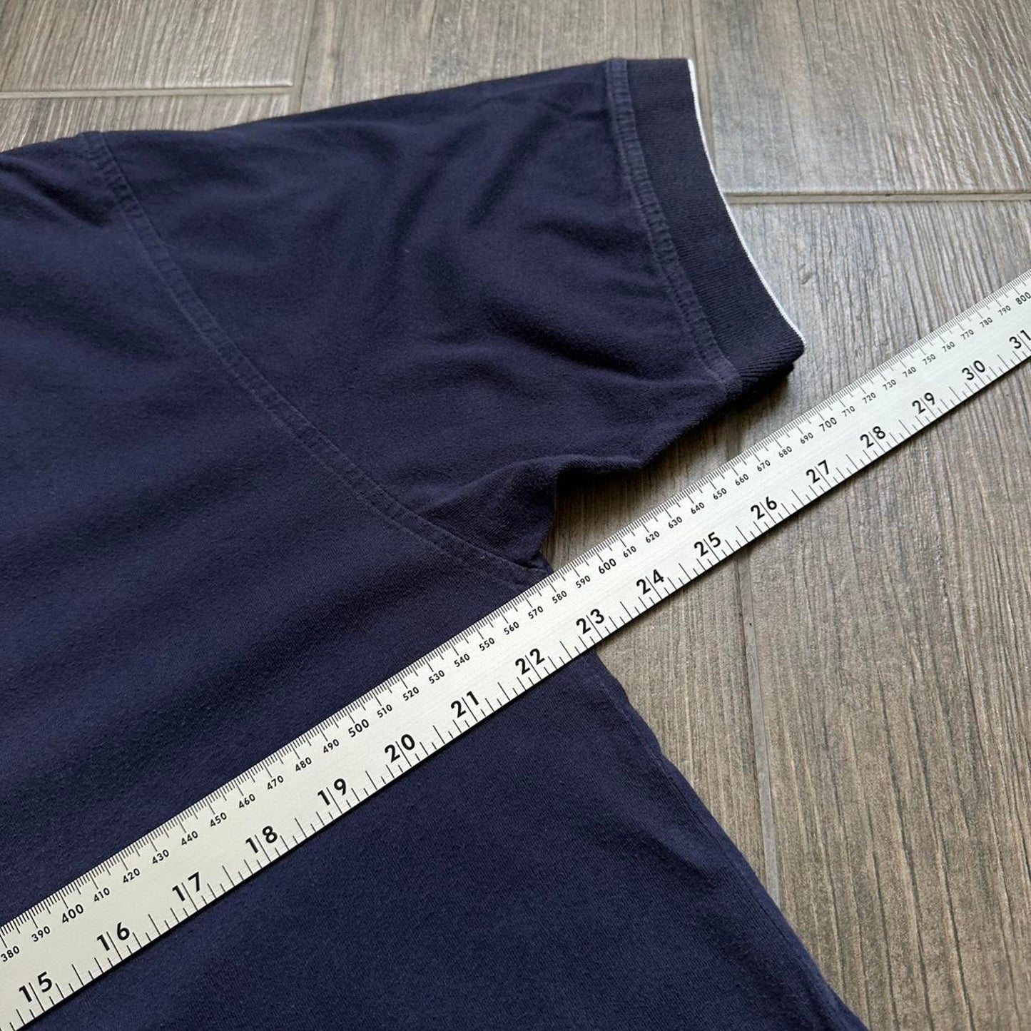 Nike navy blue V-neck t-shirt with white accents