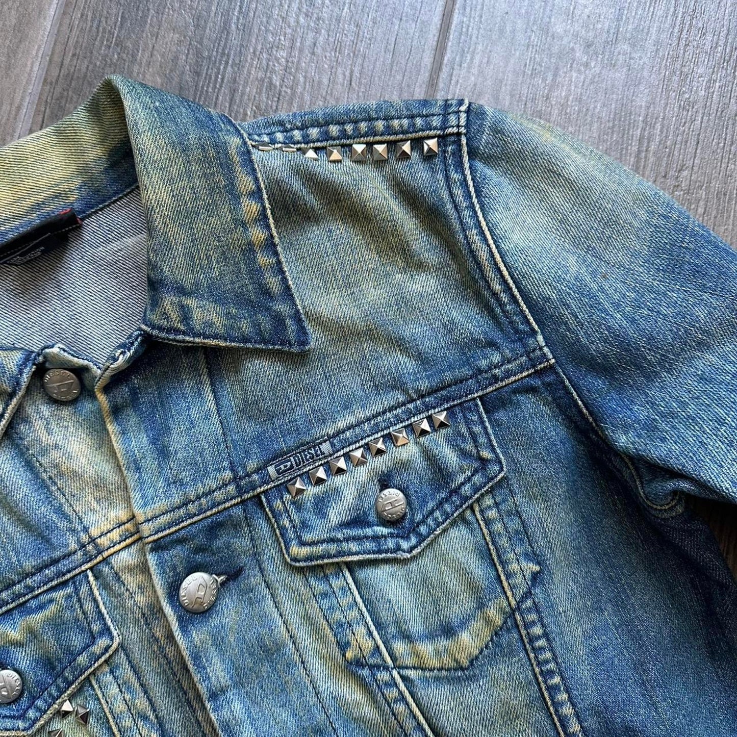 Diesel studded denim jacket with a grunge vibe