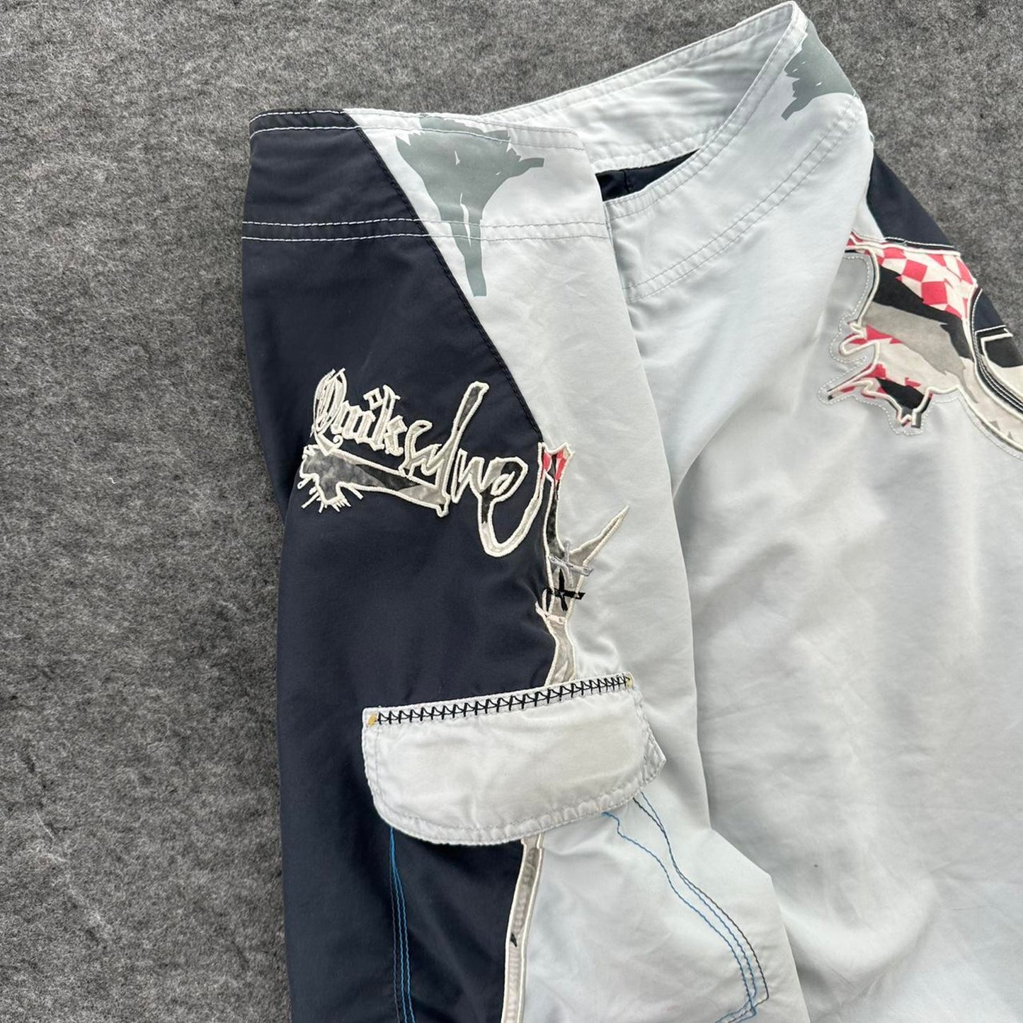Quiksilver white board shorts with
