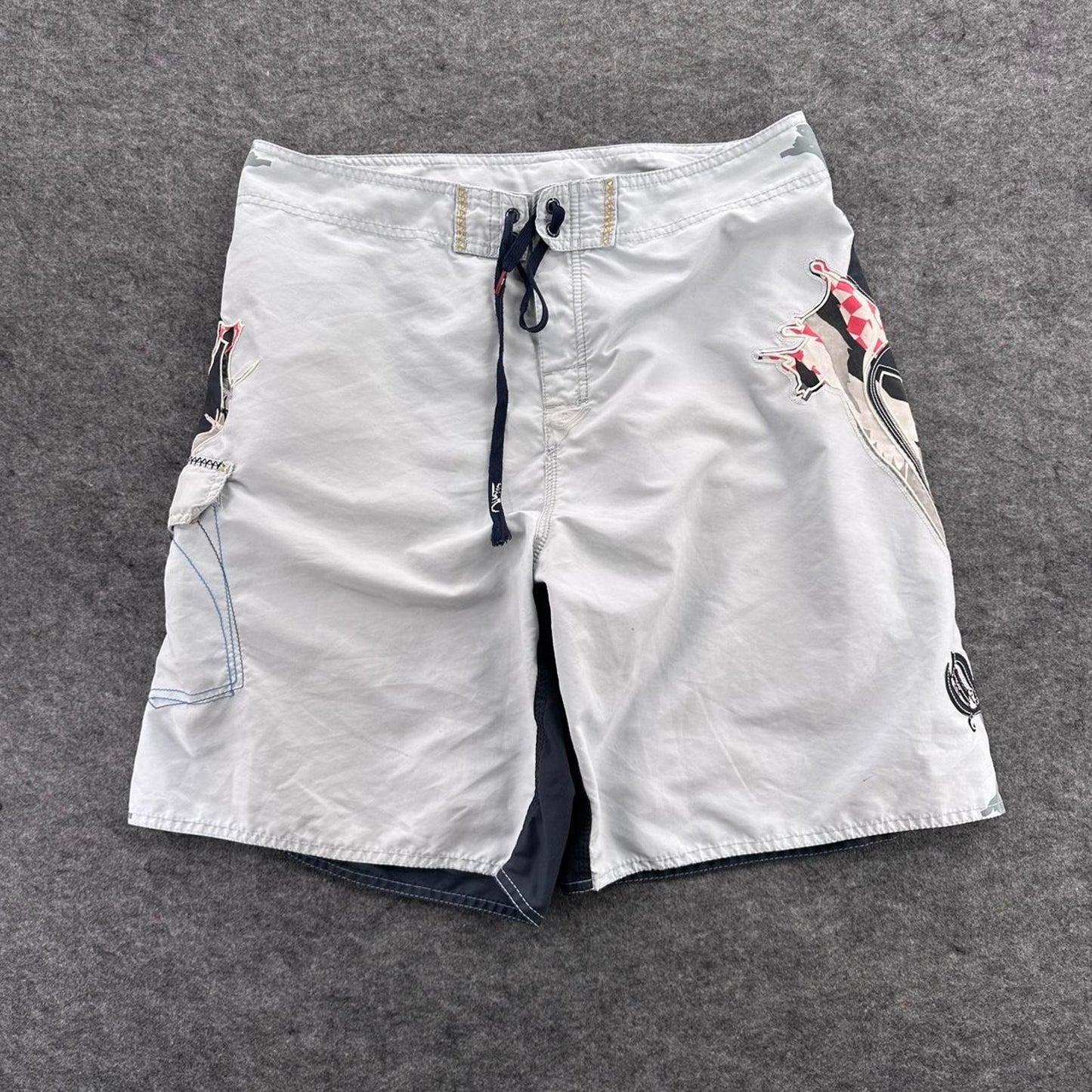 Quiksilver white board shorts with