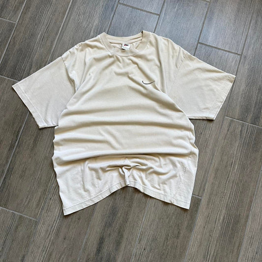Cream Nike tee with embroidered swoosh