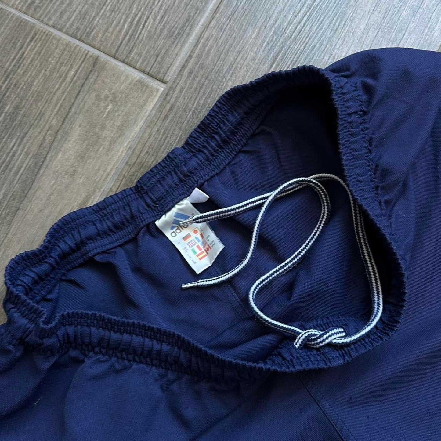 Adidas navy blue shorts with white stripes
