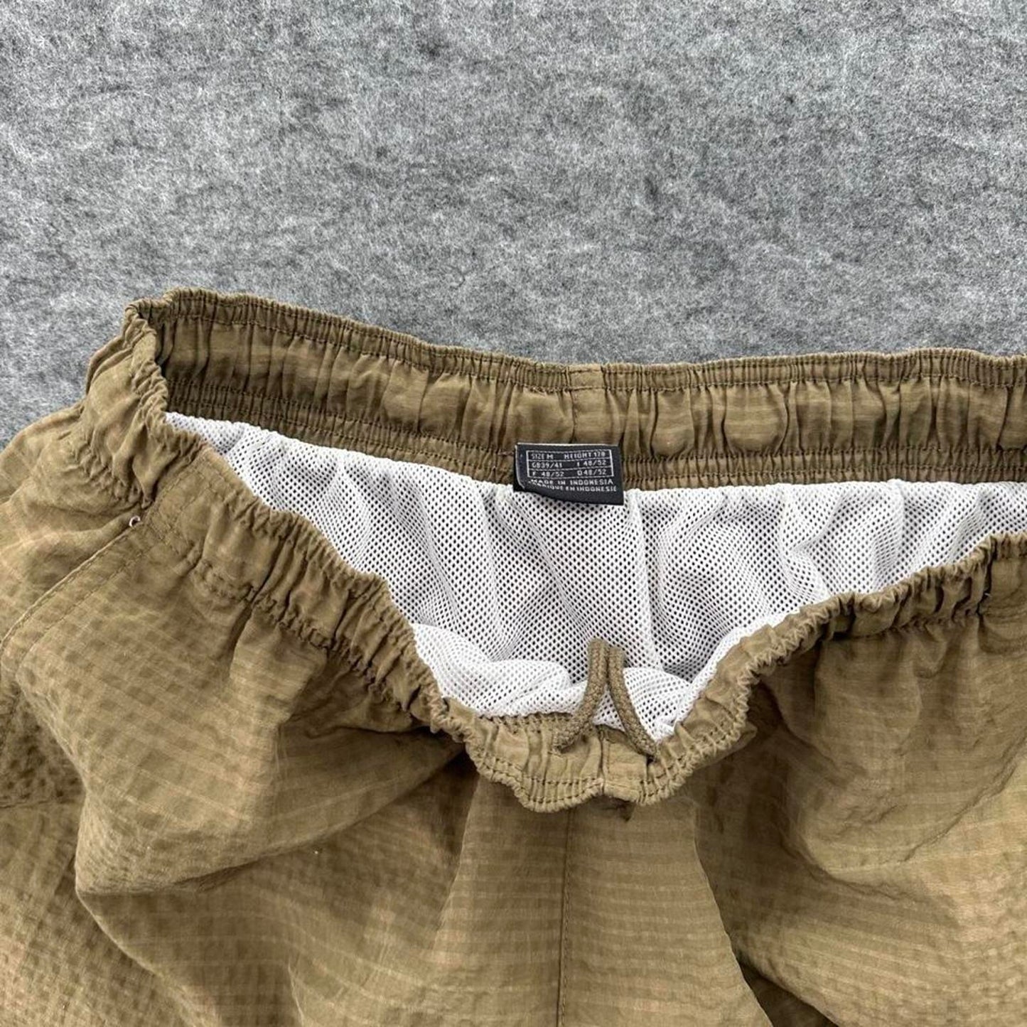 Nike brown shorts with white