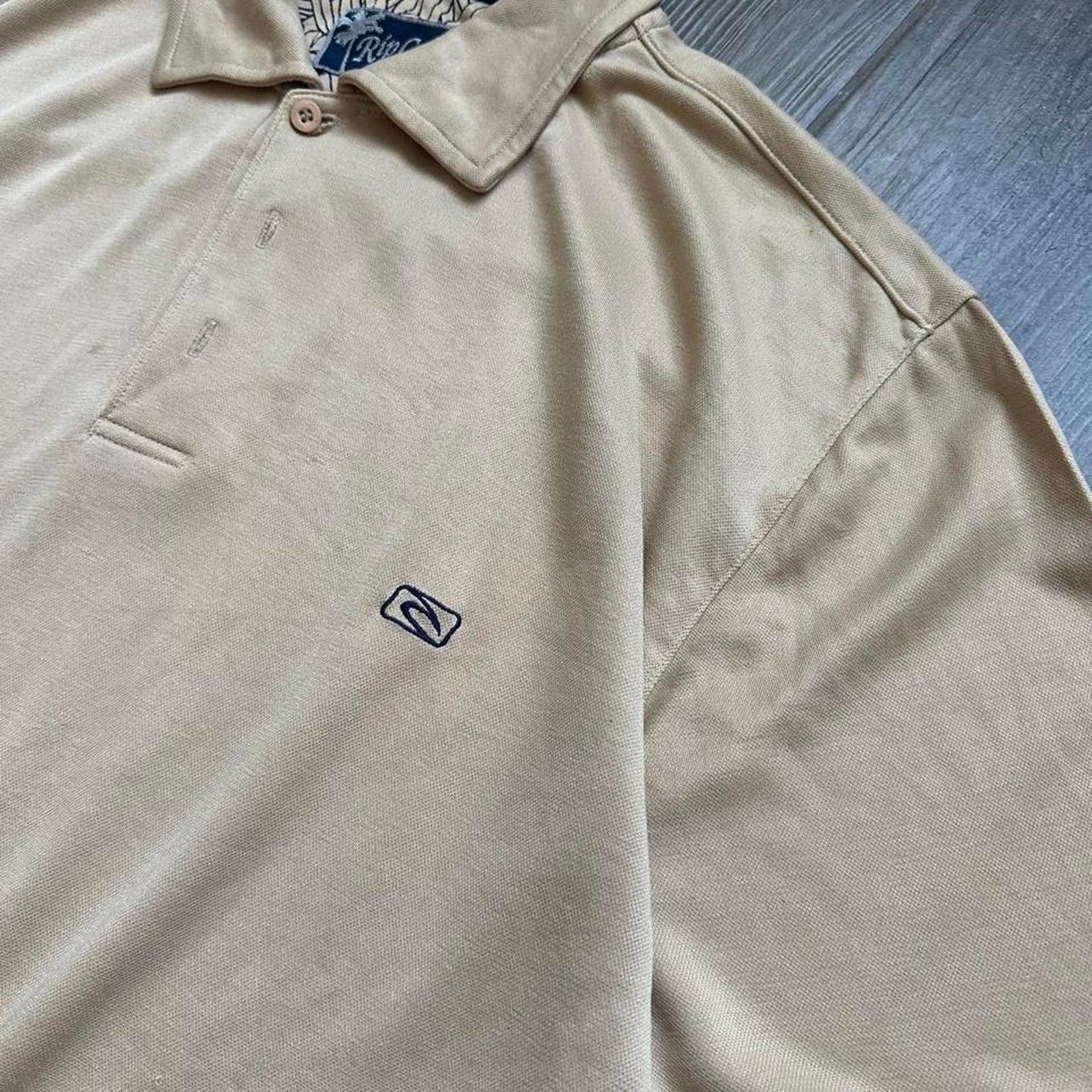 Rip curl tan polo shirt