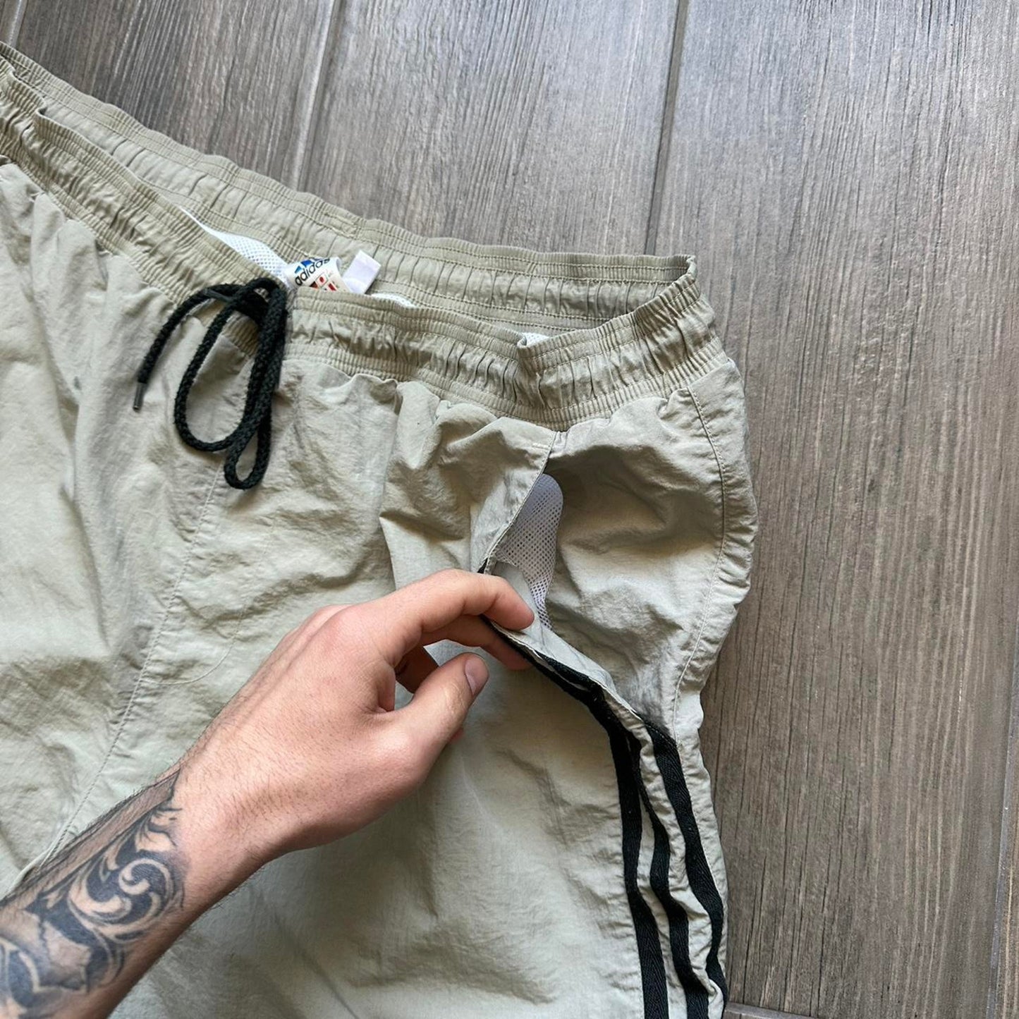 Adidas khaki shorts with drawstring waist and pockets