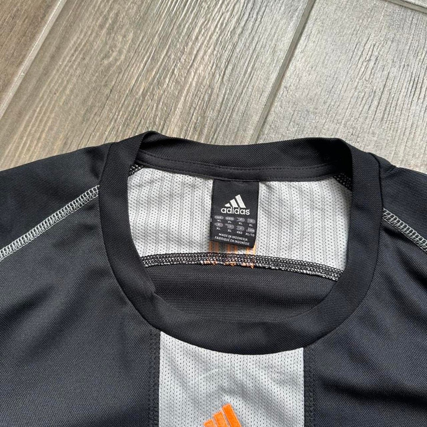 Adidas black and grey striped t-shirt