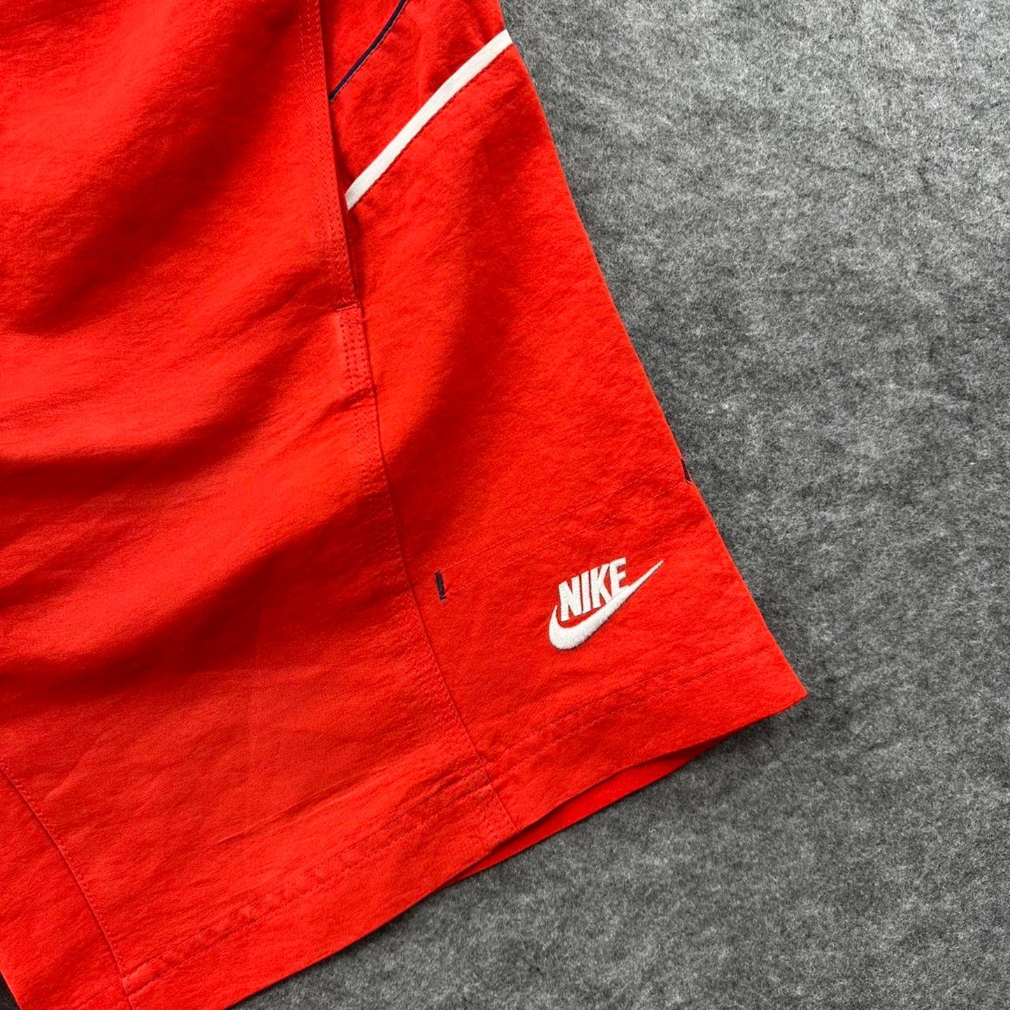 Nike red shorts with white