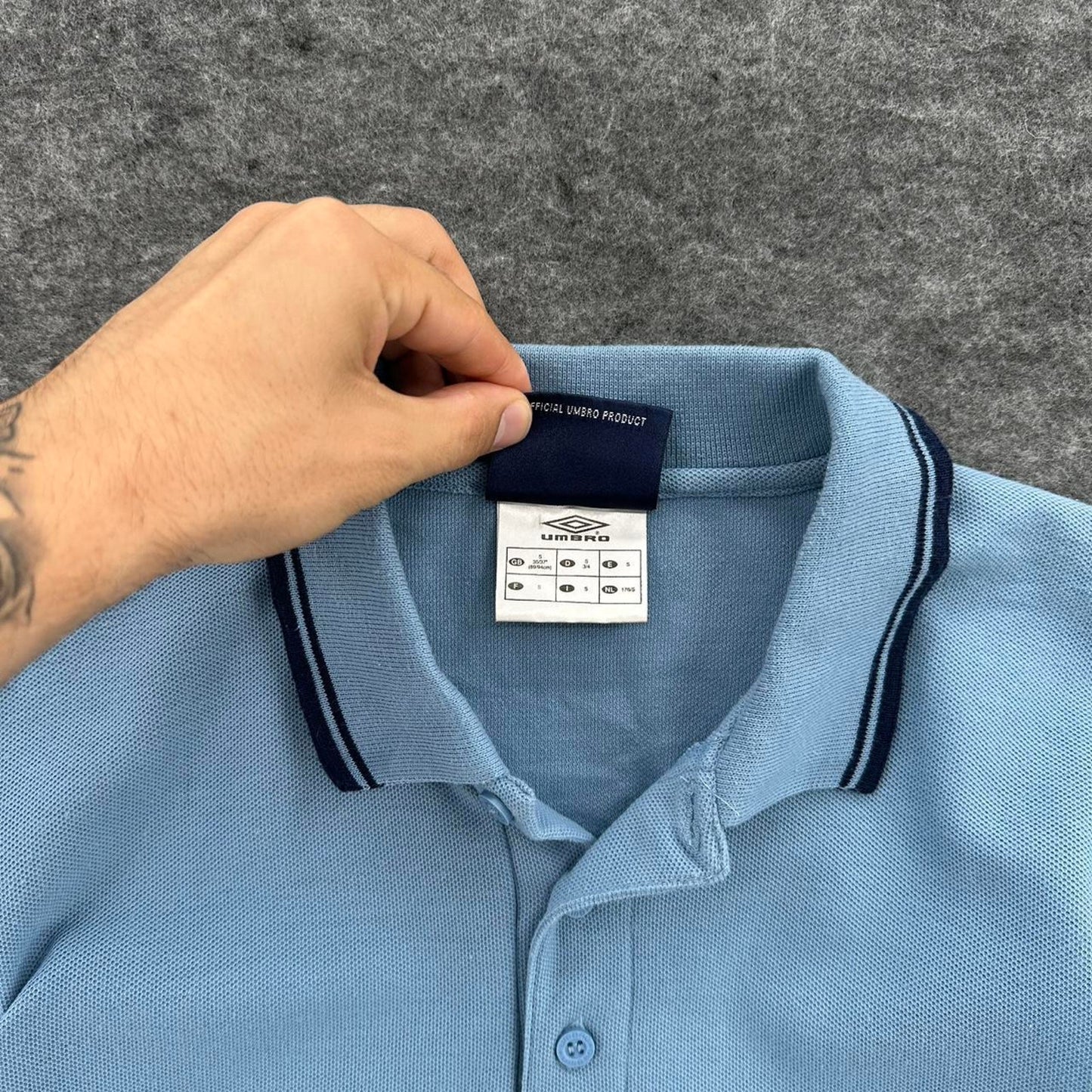 Umbro blue polo shirt