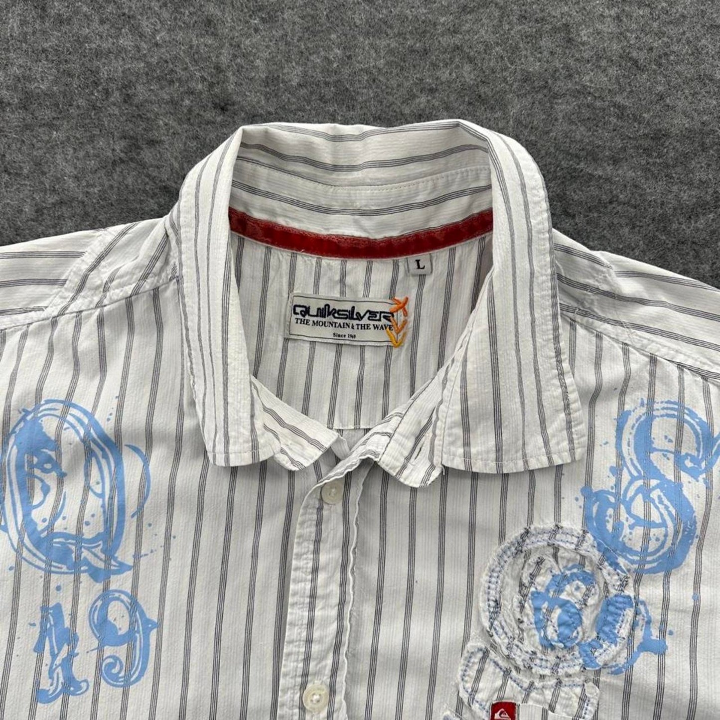 Quiksilver white and blue striped