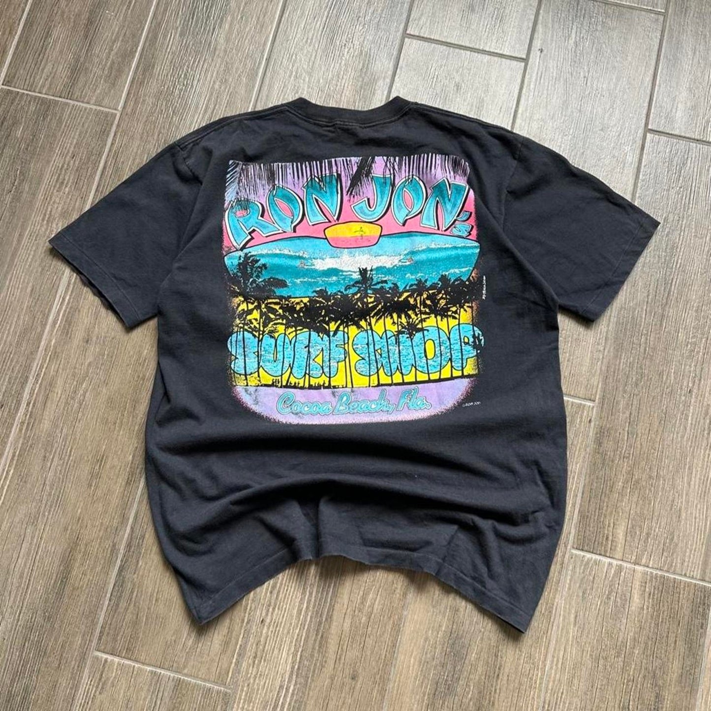 Ron Jon Surf Shop black t-shirt with colorful graphic