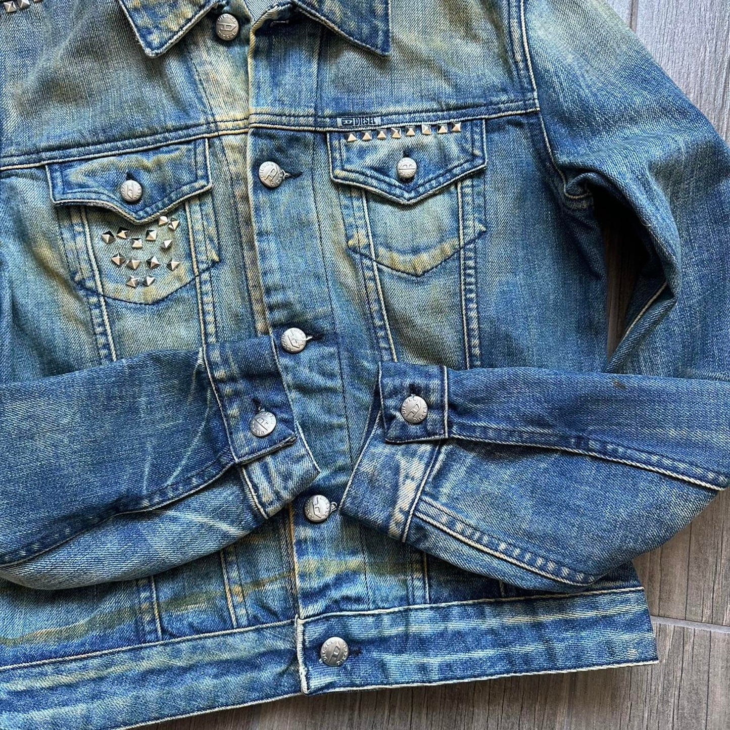 Diesel studded denim jacket with a grunge vibe