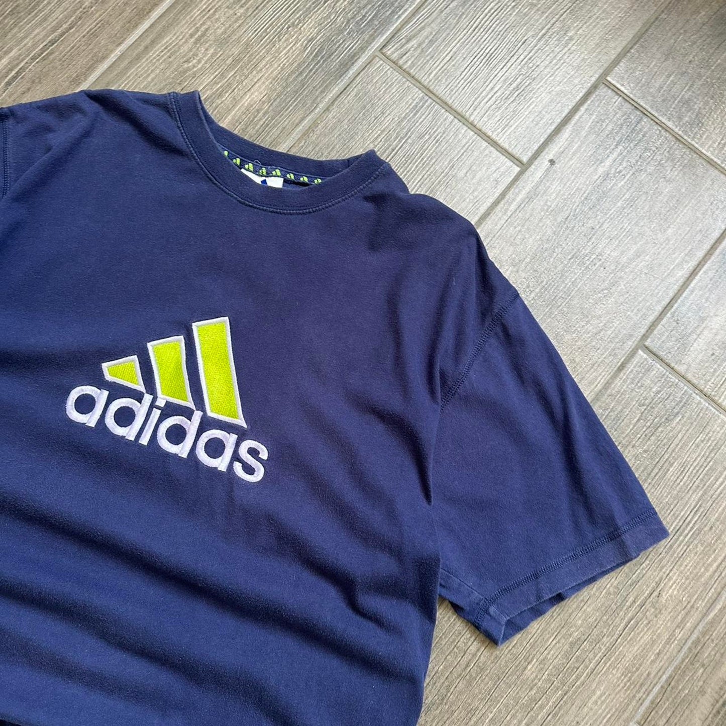 Adidas navy blue t-shirt with yellow and white logo